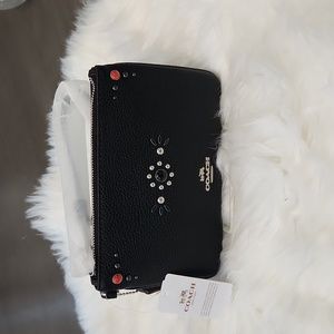 NWT. Coach Western Rivits pebbled leather wristlet